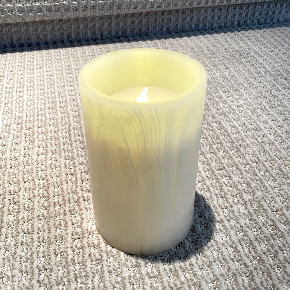 HomeGoods, Part wax, part plastic, 8” high x 5” diameter, cream color Candle